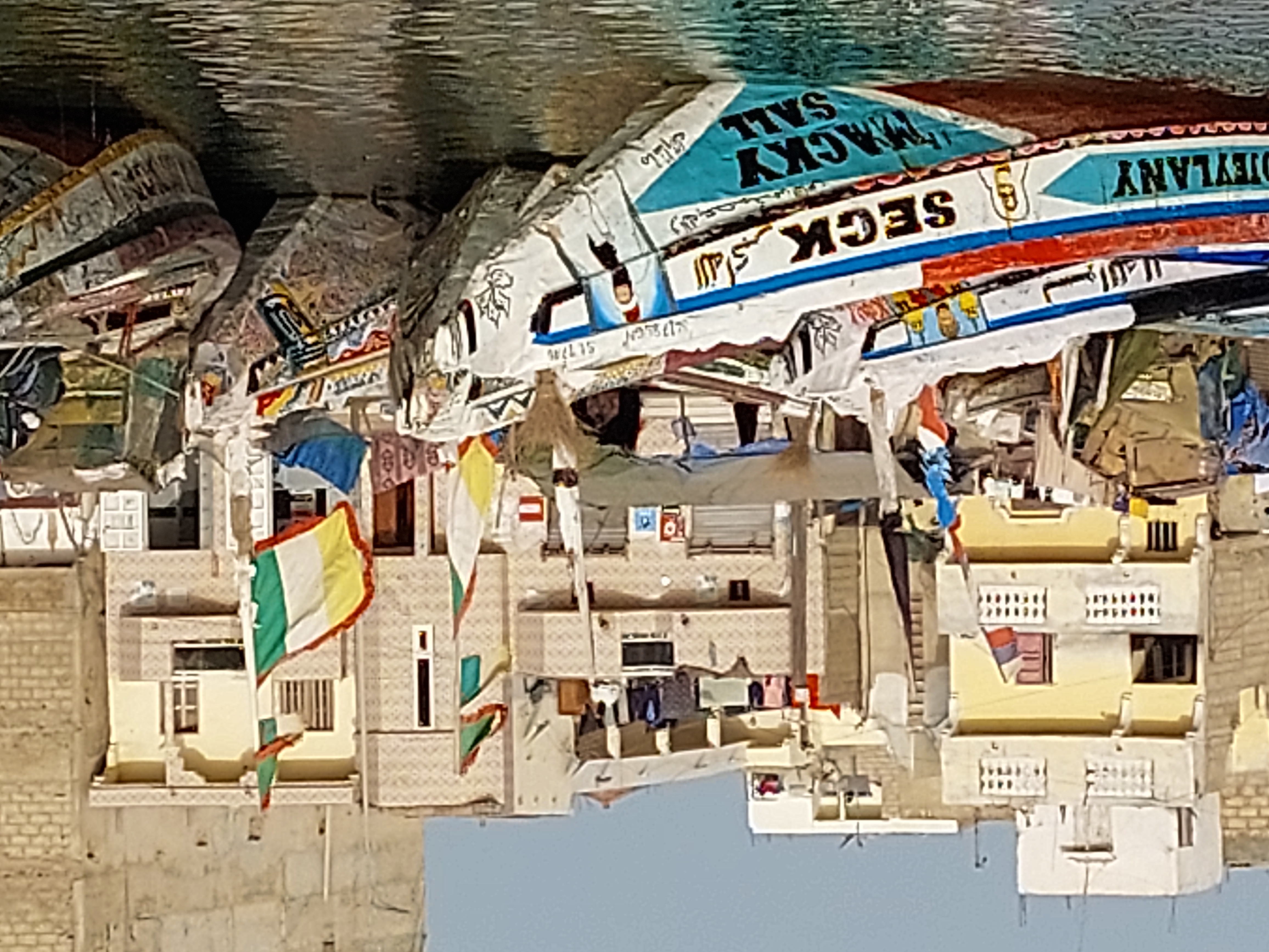 The need for creating Opportunities in the home country: boats for sale with the signature of the president- seen in Saint Louis(Senegal) Image